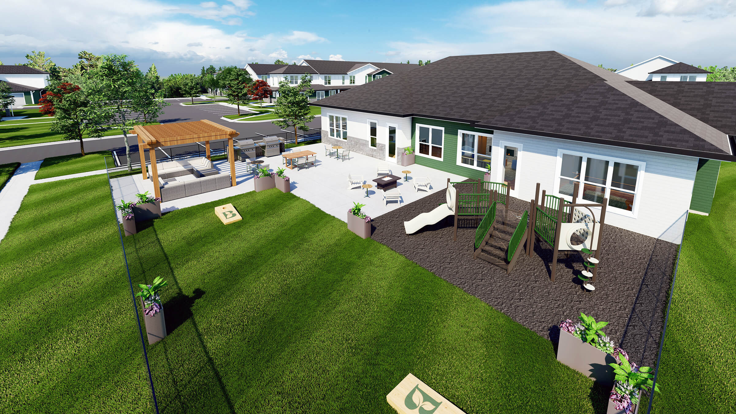 brookgreen townhomes community patio with pergola seating, playground, and outdoor games