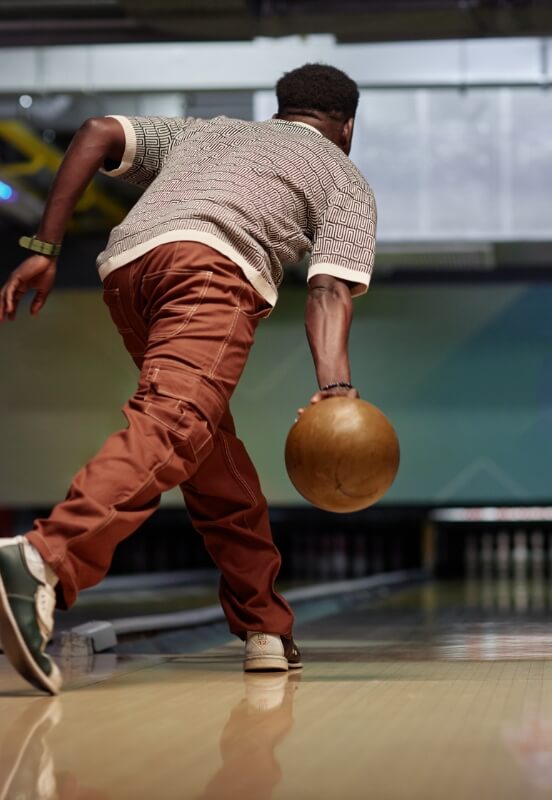 man bowling at a local bowling alley in river falls